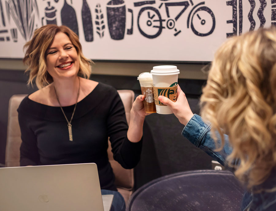 Kim-Kopec-helping-a-client-with-their-website